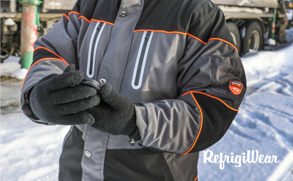 Close up of someone using their phone with the Dual-Layer Thermal Touchscreen Gloves outside in the snow.