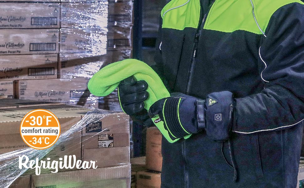 Man in cold storage facility wearing RefrigiWear's Heated gloves