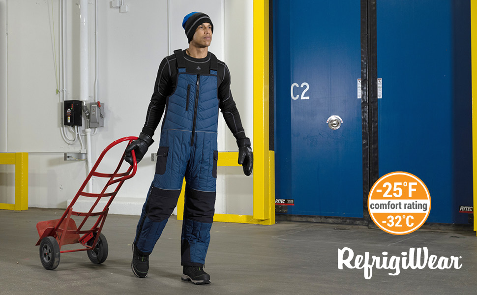Man wearing Frostline Bib Overalls in cold storage facility